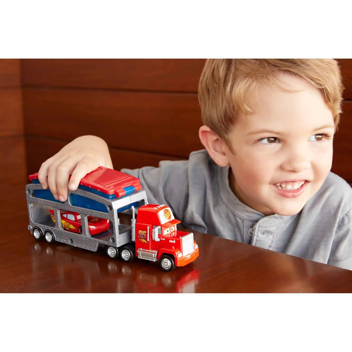 Disney/Pixar Cars Mack Dip & Dunk Trailer with Lightning McQueen